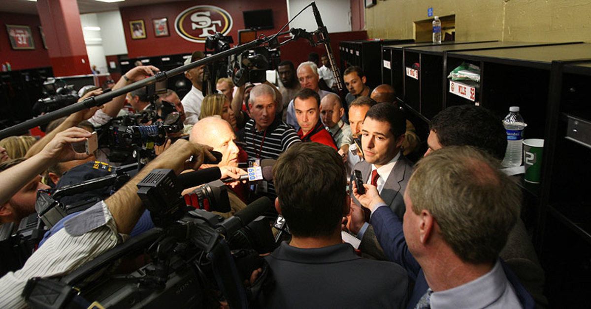Competition on the NFL beat is high in every NFL city, with reporters from websites, newspapers, TV and radio stations all trying to get the scoop first.  (Michael Zagaris/Getty Images)