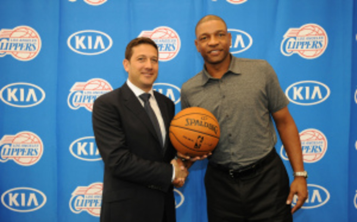 Doc Rivers said Thursday that Danny Ainge's claim that it was the coach's decision to leave Boston is untrue. (Andrew D. Bernstein/Getty Images)