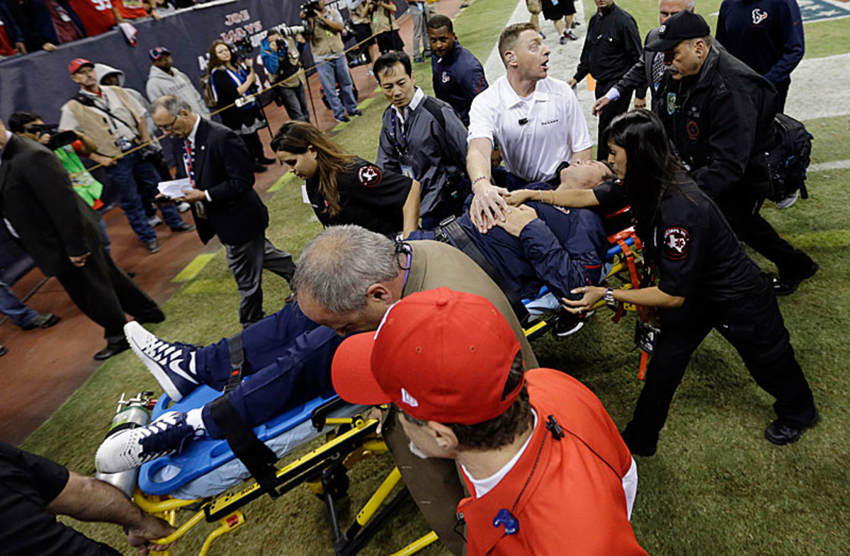 Gary Kubiak fell to his knees at halftime of the Texans' Sunday night game against the Colts and was rushed to the hospital. Kubiak never lost consciousness and didn't suffer a heart attack, according to the team. (David J. Phillip/AP)