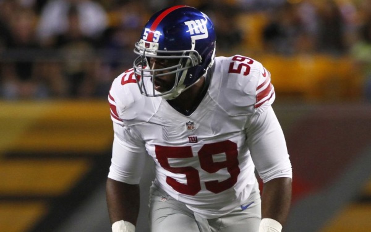 Former first-round pick Aaron Curry will retire from the NFL. (Justin K. Aller/Getty Images)