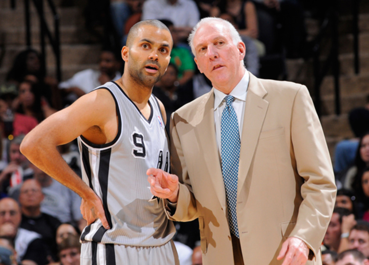 Spurs coach Gregg Popovich, right, is the subject of a Sports Illustrated story this week. (D. Clarke Evans/Getty Images)
