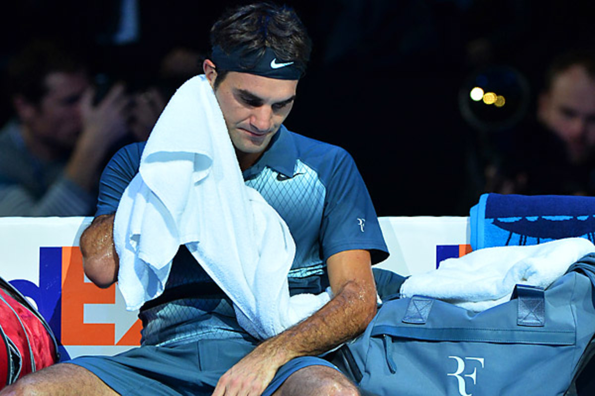 Roger Federer responded sarcastically in his press conference after another loss to Novak Djokovic. (Ben Stansall/Getty Images)