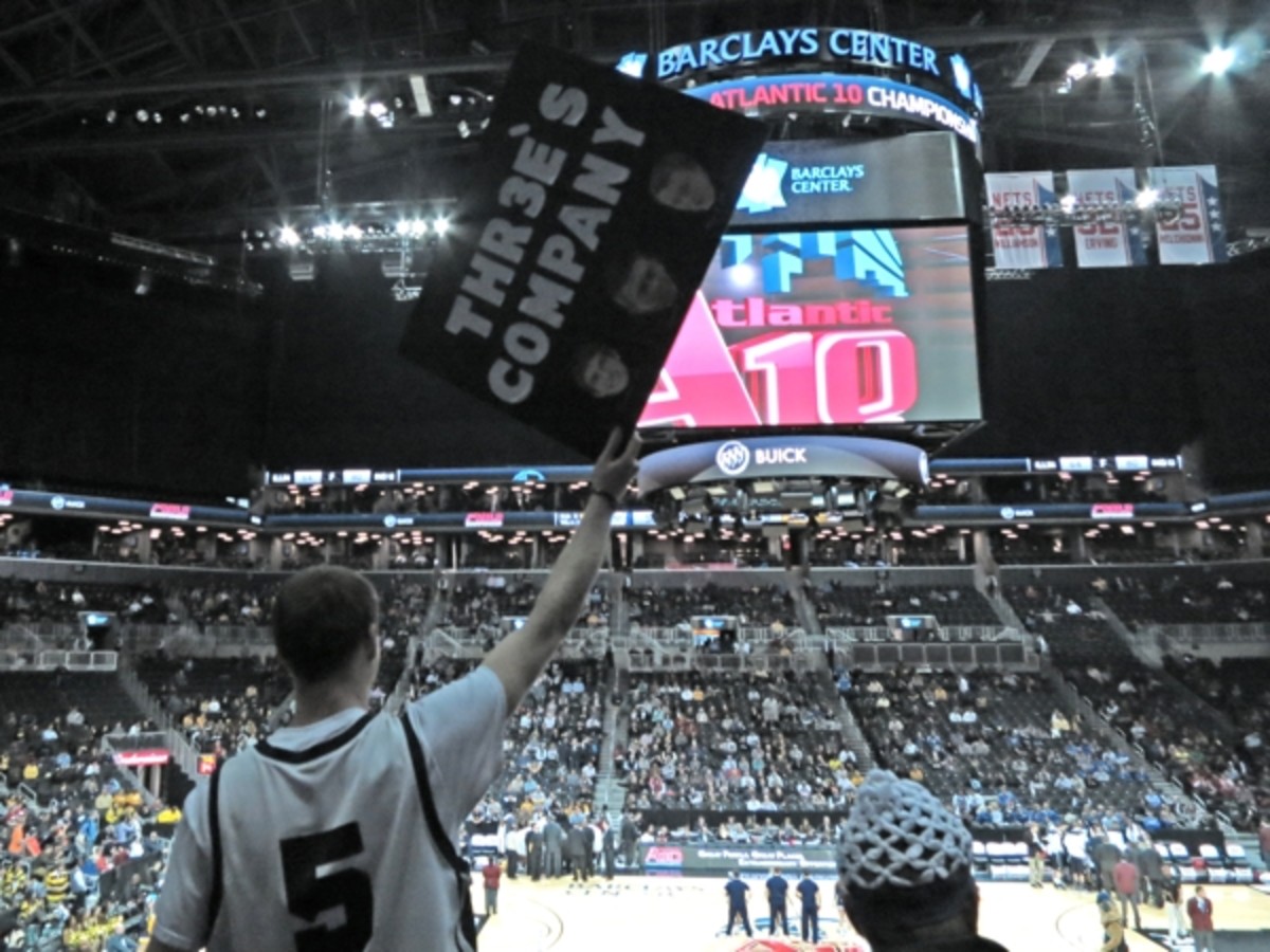 A Butler fan hoisting his Kellen Dunham/Rotnei Clarke/Chase Stigall sign during the second half