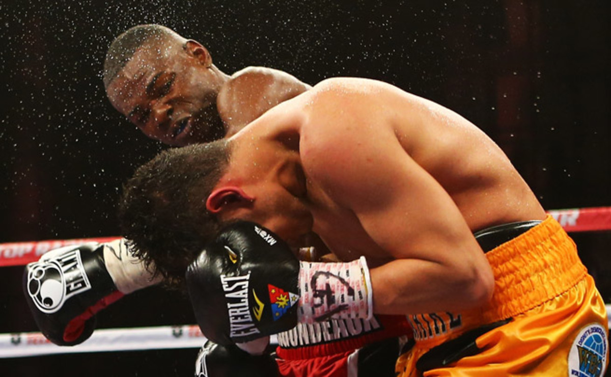In a unanimous decision, Guillermo Rigondeaux (back) beat Nonito Donaire at Radio City Music Hall.