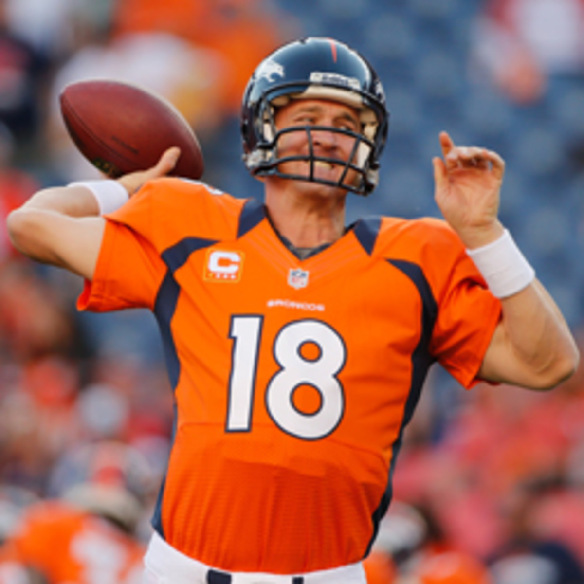 Broncos quarterback Peyton Manning is working out with three of his receivers at Duke University. (Doug Pensinger/Getty Images)