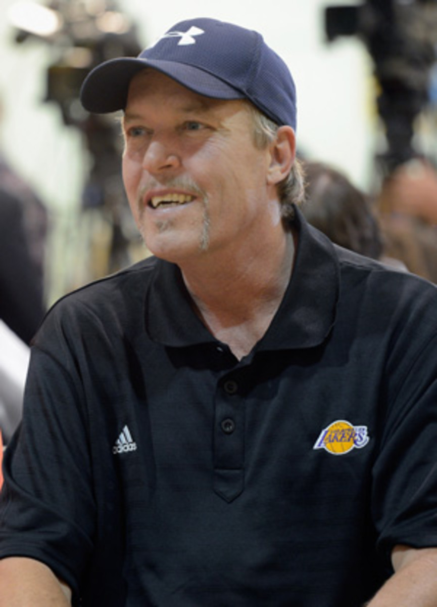 Lakers executive Jim Buss is doing his best to keep the faith. (Kevork Djansezian/Getty Images)