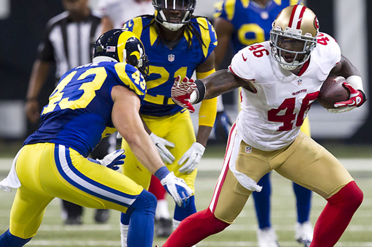 Craig Dahl (43) will now experience the Rams-49ers rivalry from the other side. (David Welker/Getty Images)