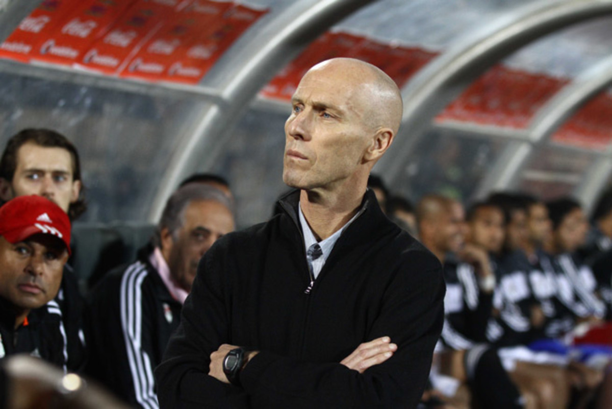 Bob Bradley stayed in Egypt despite a time of political turmoil and guided the Pharaohs to with a game of qualifying for the 2014 World Cup.