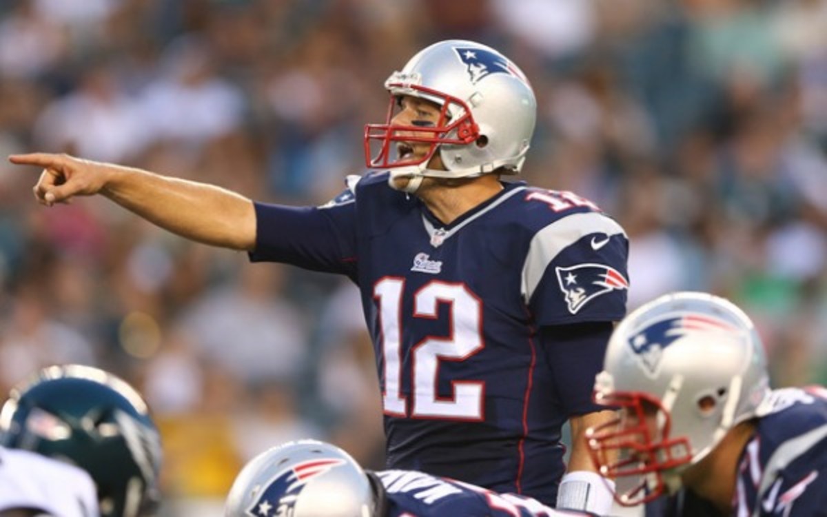Patriots quarterback Tom Brady is expected to play in the team's preseason game against the Bucs. (Getty Images)