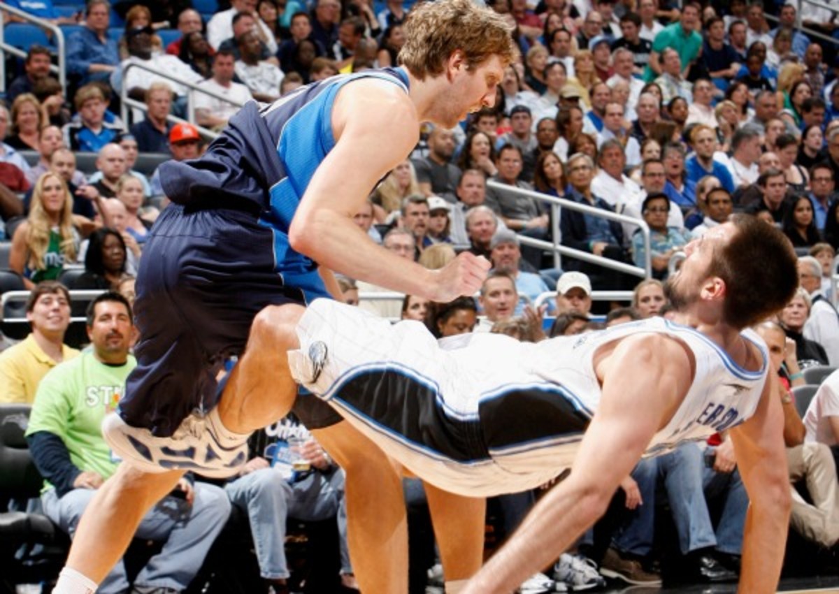 Mavericks star Dirk Nowitzki says that the NBA will never be able to eliminate flopping because it is "part of sports." (Orlando Sentinel/Getty Images)