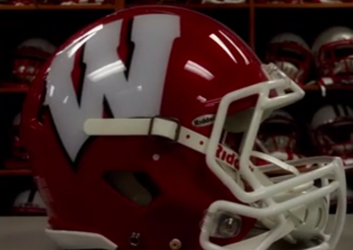 Wisconsin's red helmets are an inversion of its typical white helmet with a red logo.