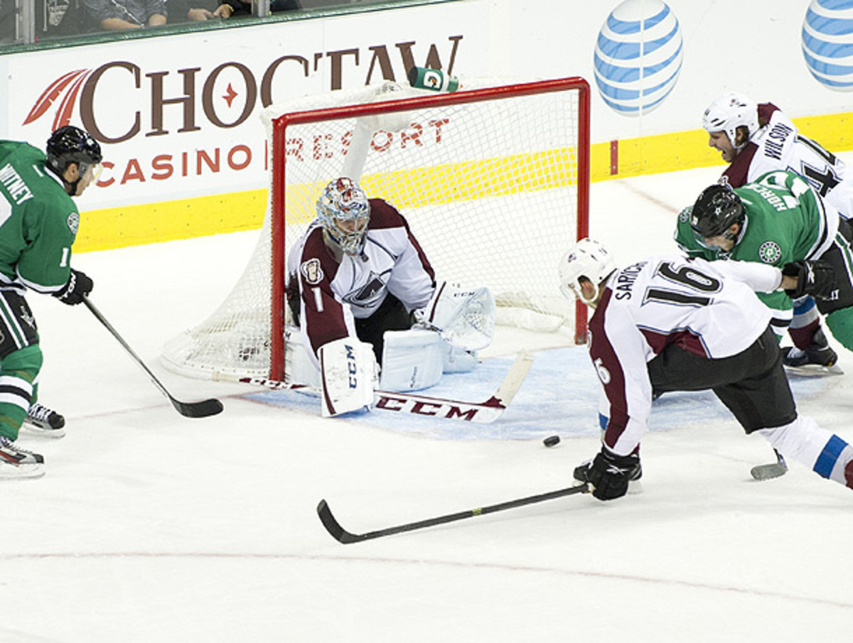 Semyon Varlamov let in two goals while helping the Avalanche top Dallas in overtime. (Cooper Neill/Getty Images)