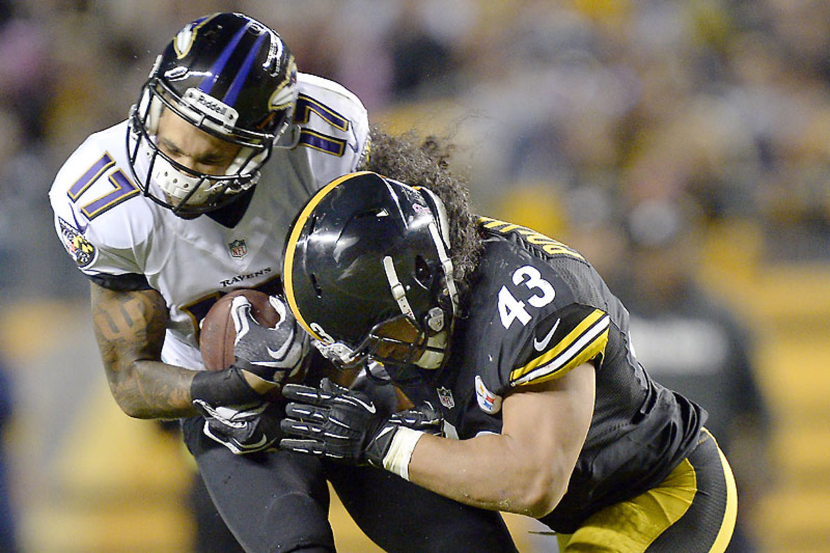 Despite the records, Ravens-Steelers didn't lack for passion or hard hits, especially from the reinvigorated Troy Polamalu. (Don Wright/AP)