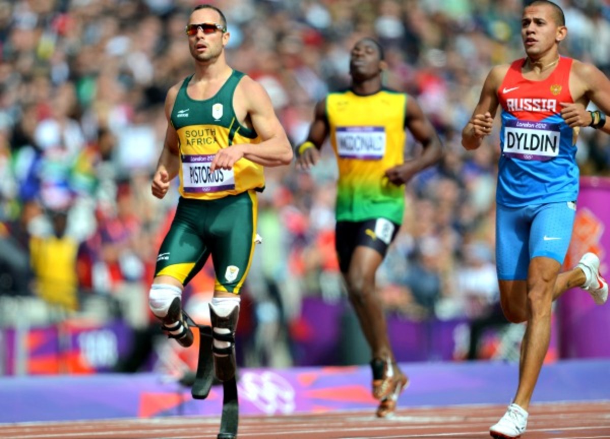 Oscar Pistorius will be indicted for premeditated murder in the shooting death of his girlfriend on year after running in the Olympics. (ERIC FEFERBERG/AFP/Getty Images)