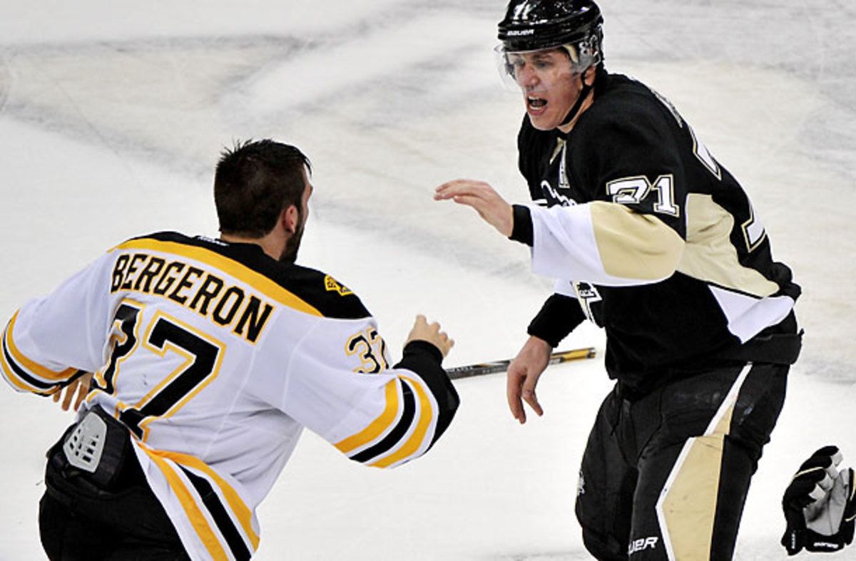Evengi Malkin and the Penguins were thrown off their game by Patrice Bergeron and the Bruins in Game 1. (Jamie Sabau/Getty Images)