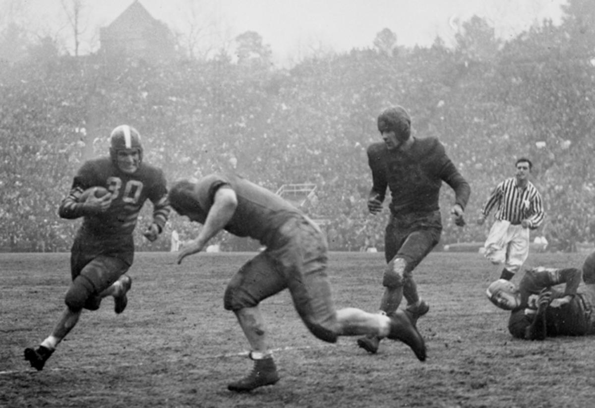 In a muddy, hard-fought game in North Carolina, Oregon State upset Duke, 20-16. 