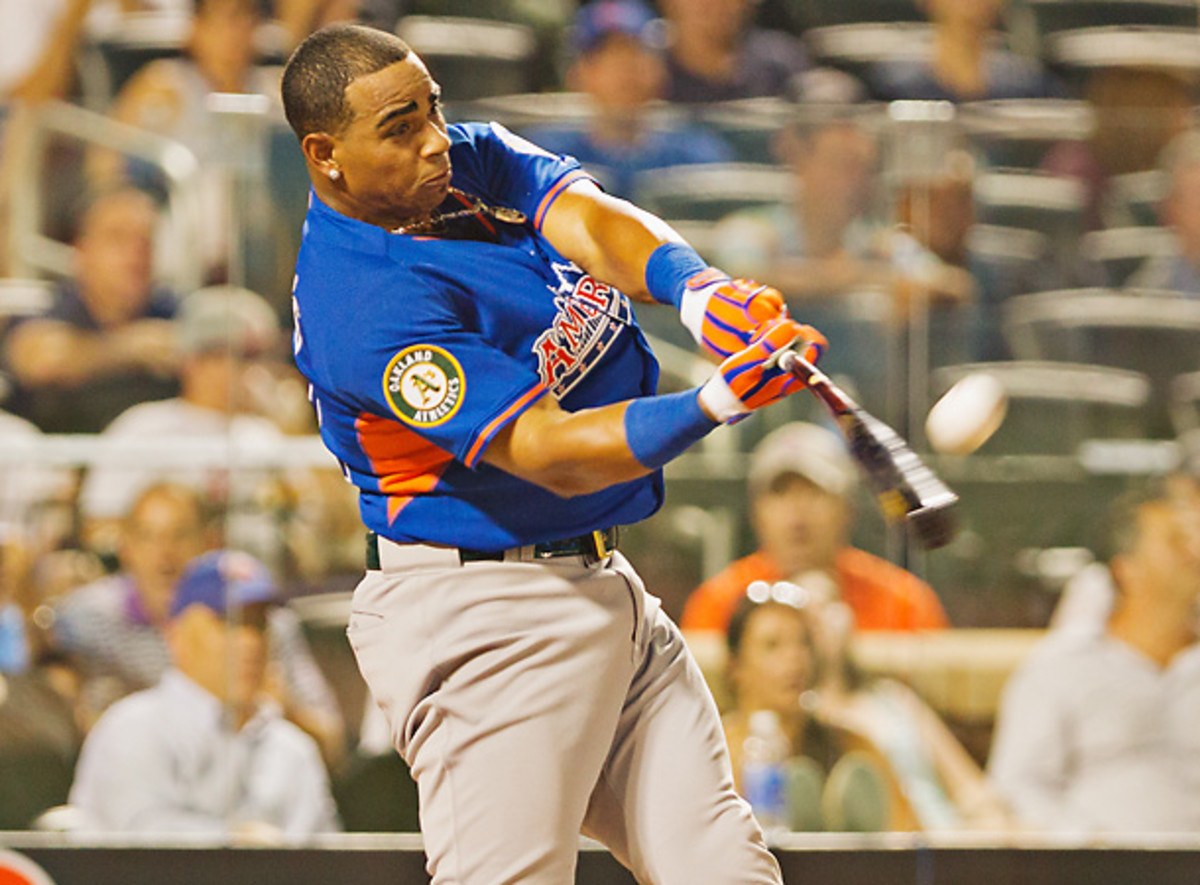 Yoenis Cespedes blasts one of his towering home runs from his Home Run Derby performance. [Chuck Solomon/SI]