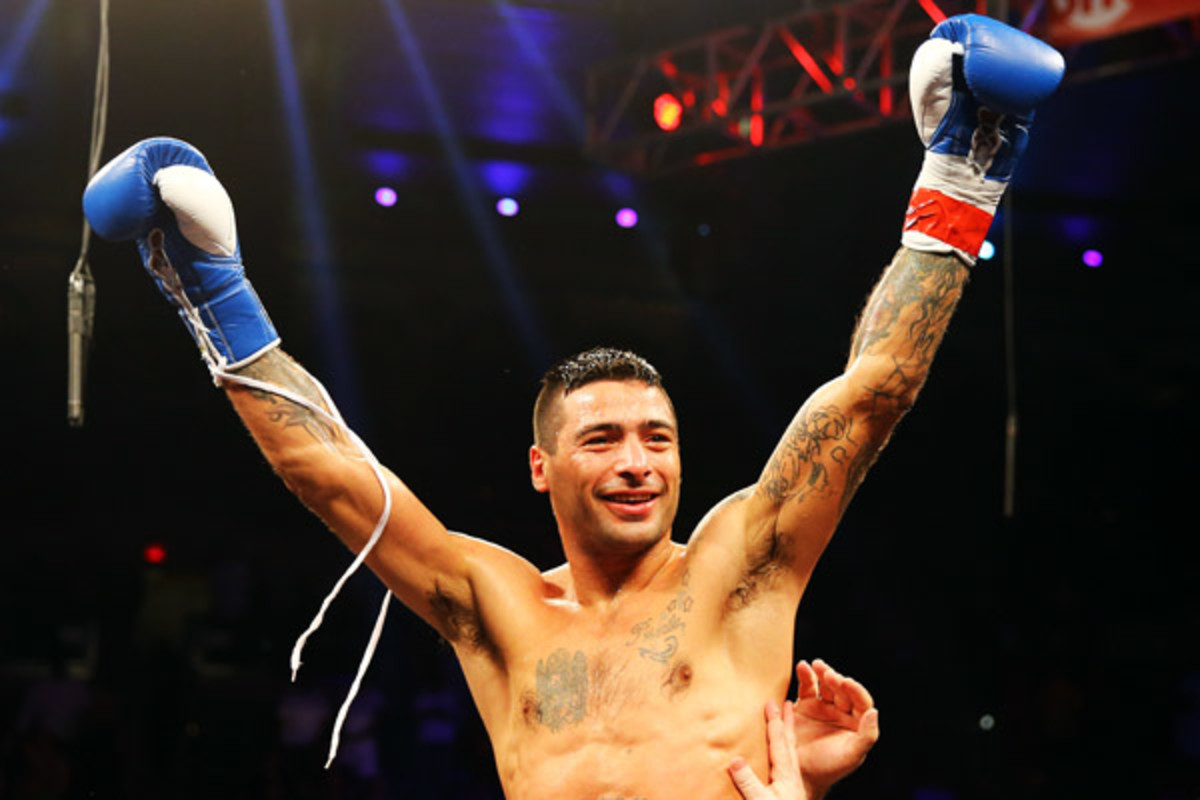Lucas Matthysse celebrates after his TKO victory over Lamont Peterson in May. (Al Bello/Getty Images)
