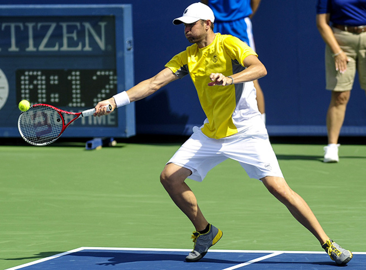 Mardy Fish, who earned a wild-card entry, defeated No. 11-seeded Evgeny Donskoy 6-3, 3-6, 6-1.