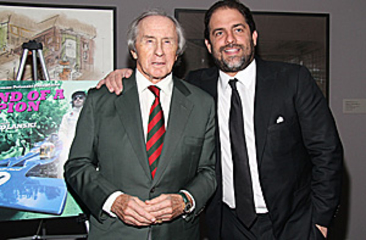 The ever dashing Sir Jackie with Brett Ratner at the U.S. premiere of Weekend of a Champion.