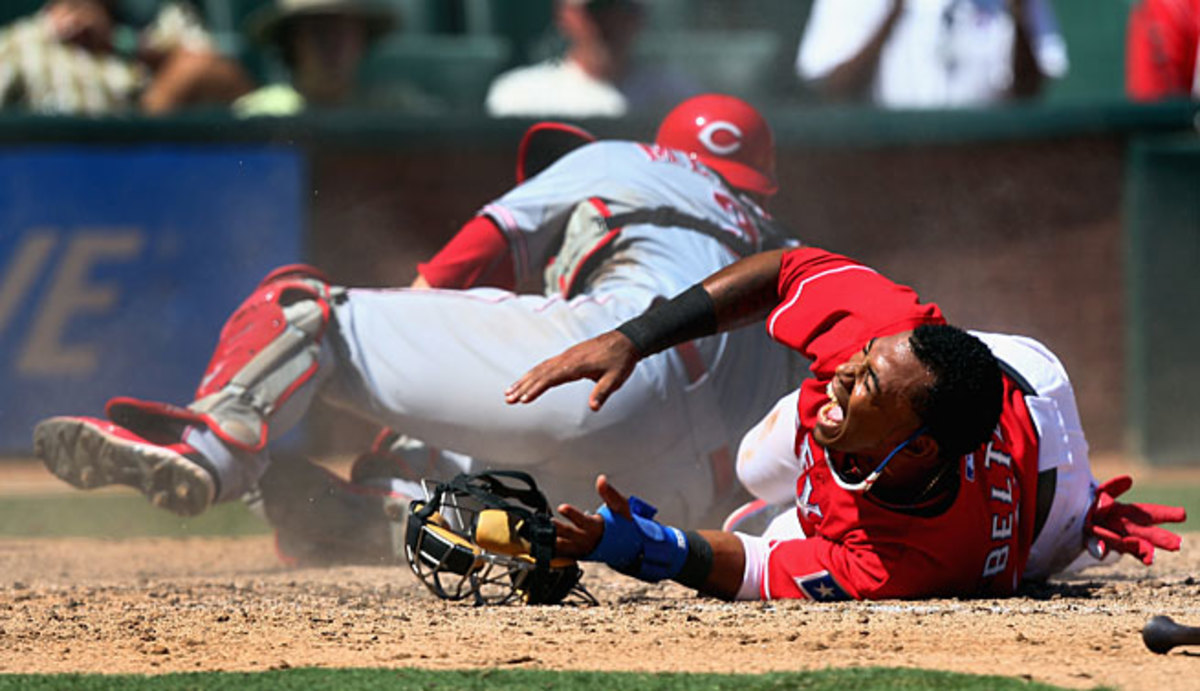 Engel Beltre (right) and Devin Mesoraco were just two of the players who in 2013 demonstrated how painful home plate collisions can be.
