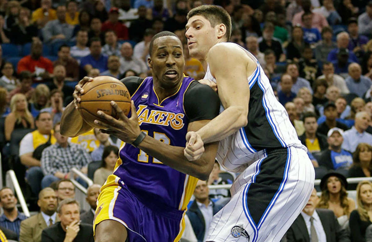 Nikola Vucevic (right) replaced Dwight Howard in Orlando and should be a Magic fixture for years to come.