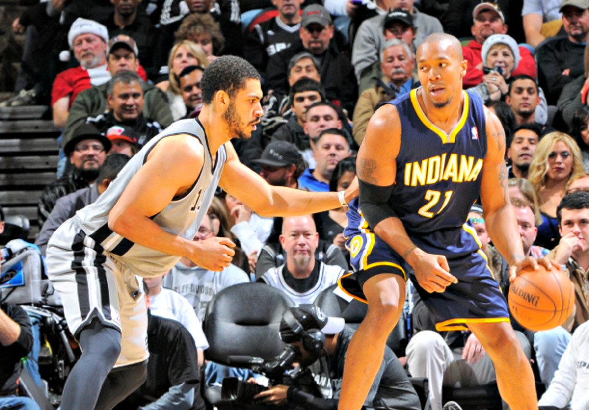 David West (right) helped the Pacers completely overpower the Spurs. (D. Clarke Evans/NBAE via Getty Images)