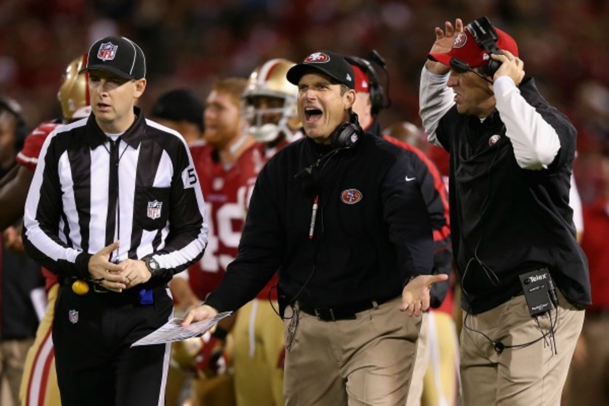 49ers coach Jim Harbaugh sought clarification on rules regarding hitting read-option quarterbacks. (Ezra Shaw/Getty Images)