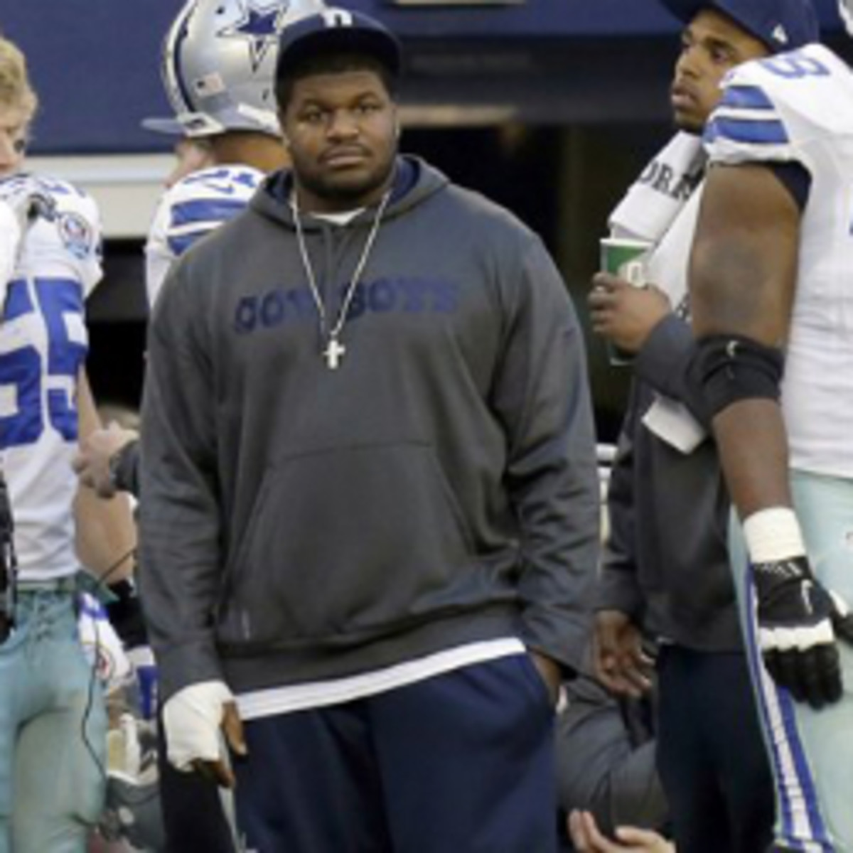 Josh Brent appeared on the Cowboys sidelines the week after a crash that killed teammate Jerry Brown. (AP)