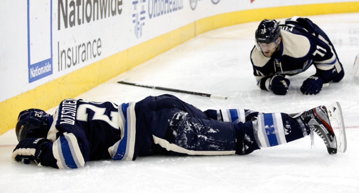 James Wisniewski lay face down on the ice for a few minutes after an awkward crash into the boards.