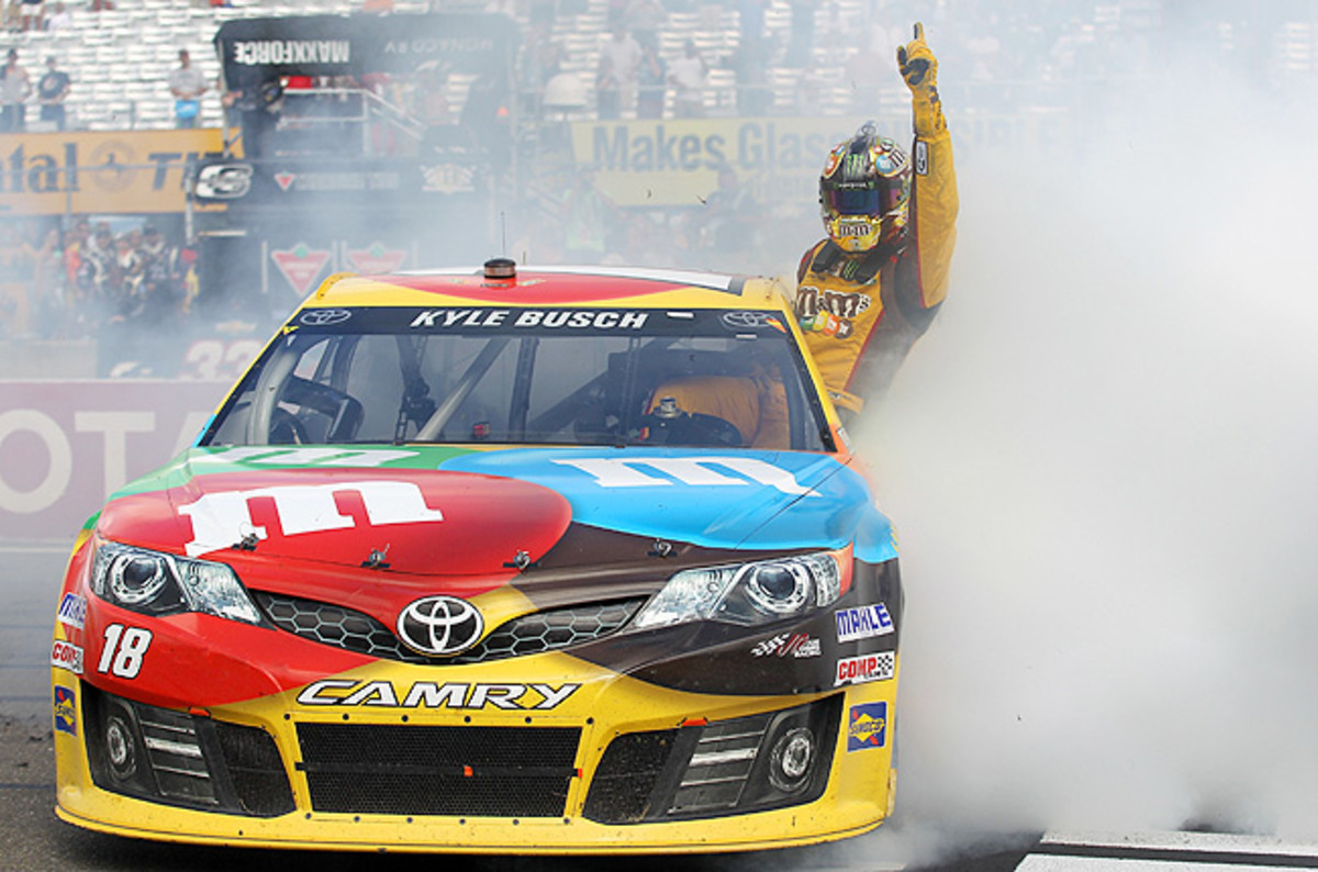 On a two-lap dash to the finish in the caution-filled Sprint Cup race, Busch held off Brad Keselowski.