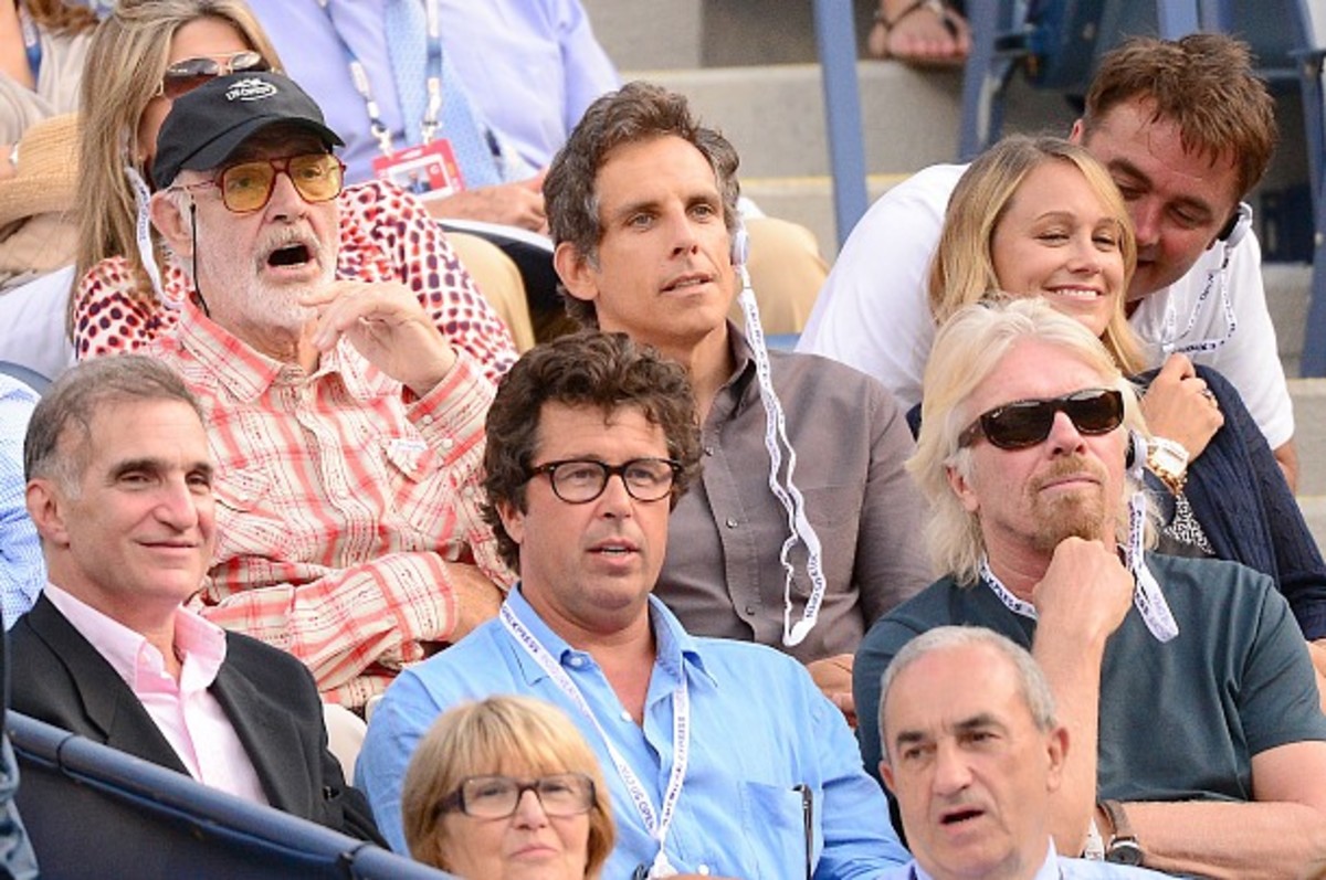 Sean Connery, Ben Stiller, Christine Taylor, and Richard Branson watch the men's semifinal. (Emmanuel Dunand/AFP/Getty Images)
