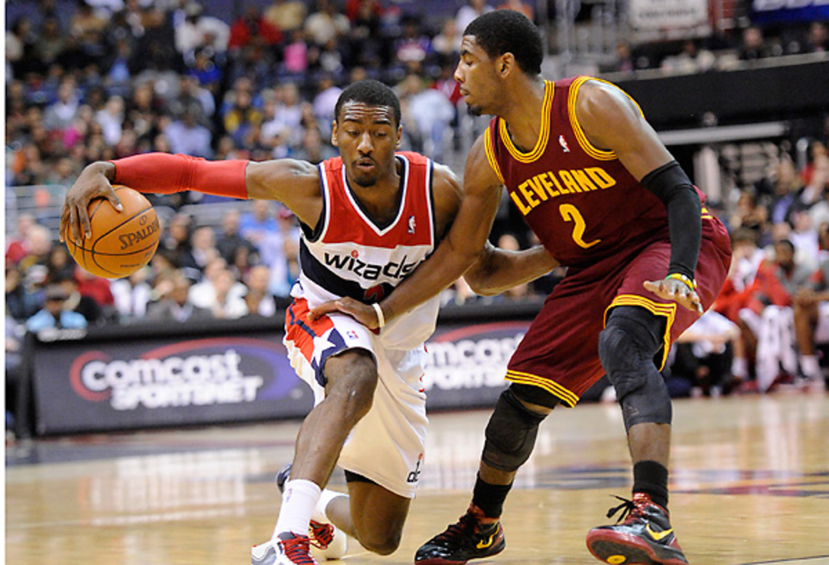 The freshly paid John Wall will battle another elite young point guard in Kyrie Irving on ___ [Nick Wass/AP]
