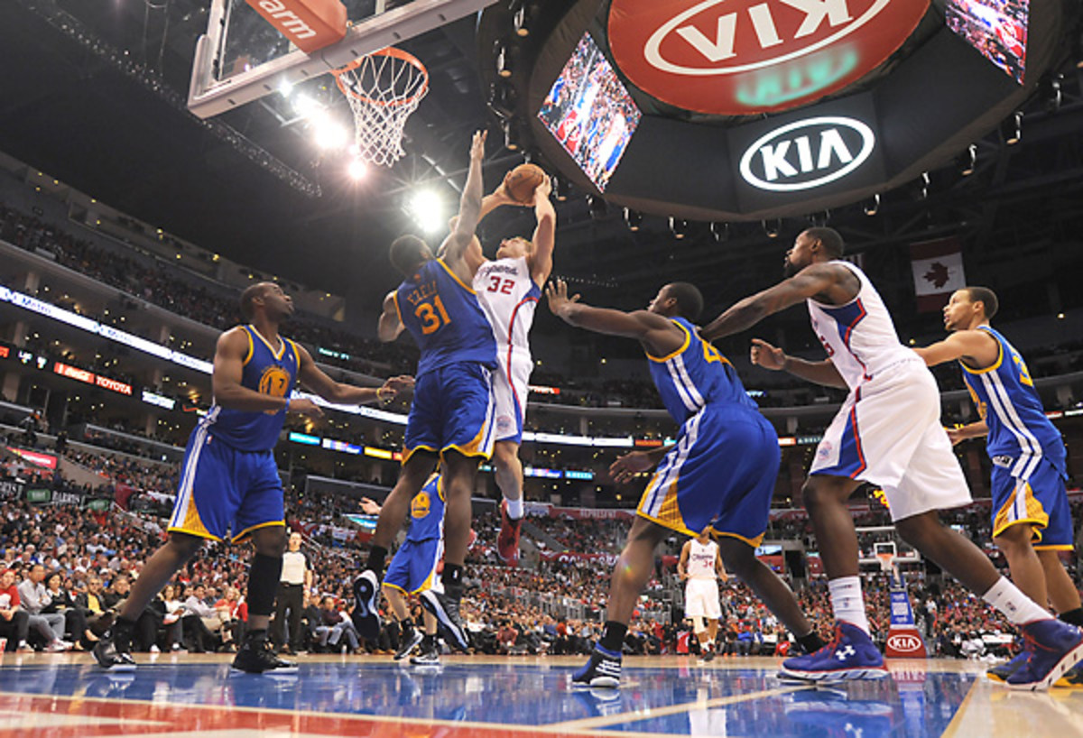 The Clippers and Warriors will cap off a five-game slate on Christmas Day 2013. [Noah Graham/Getty Images]