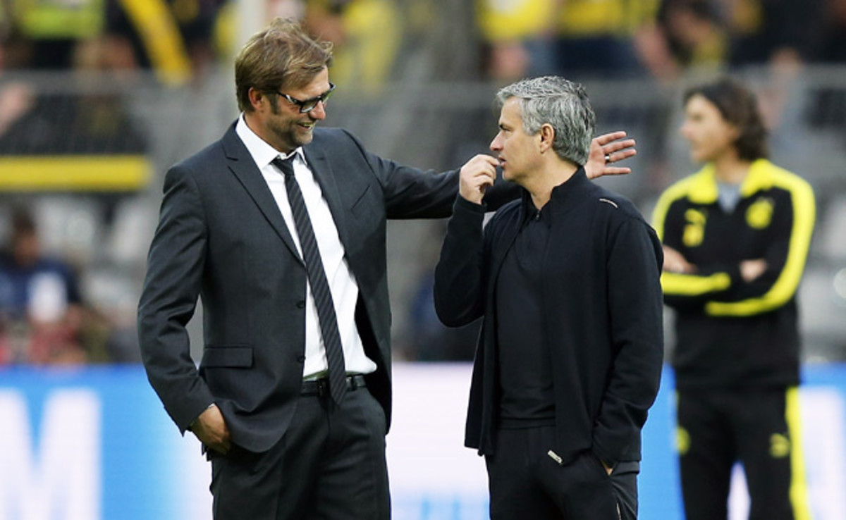 Jürgen Klopp talks with José Mourinho before the first leg of their Champions League semifinal match.