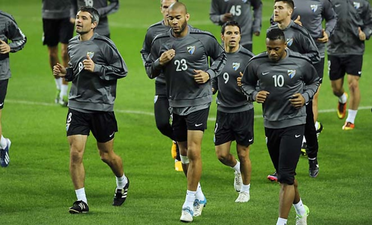 Oguchi Onyewu (23) and Malaga are down 1-0 after the first leg of their Champions League tie.
