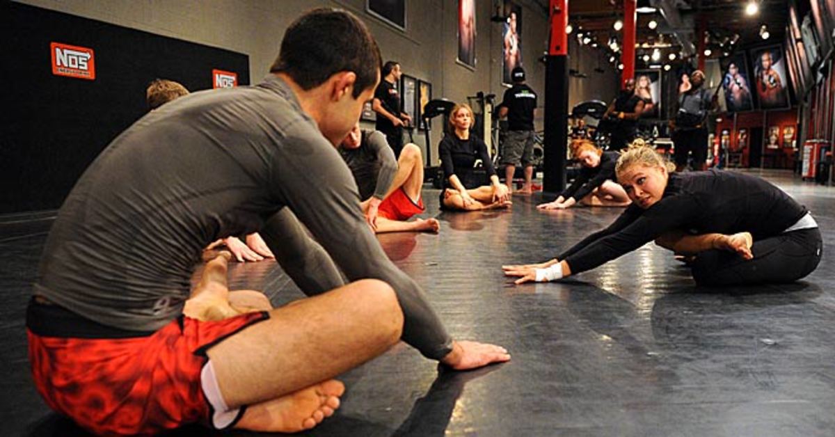 Ronda Rousey leads her team in training drills during filming of season 18 of The Ultimate Fighter.