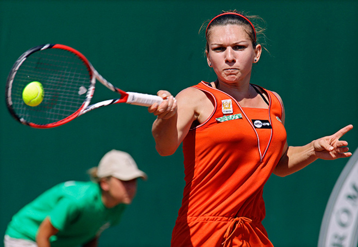 Simona Halep overcame Yvonne Meusburger to win the Budapest Grand Prix, her third title of the year.