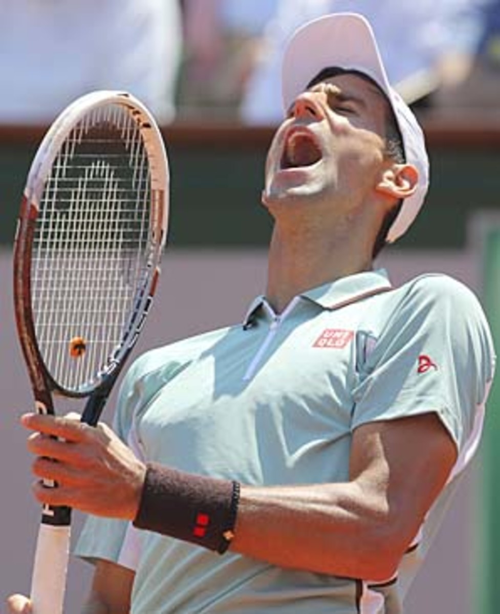 Form a break down, Djokovic broke Nadal twice to win the second set.(Michel Euler/AP)