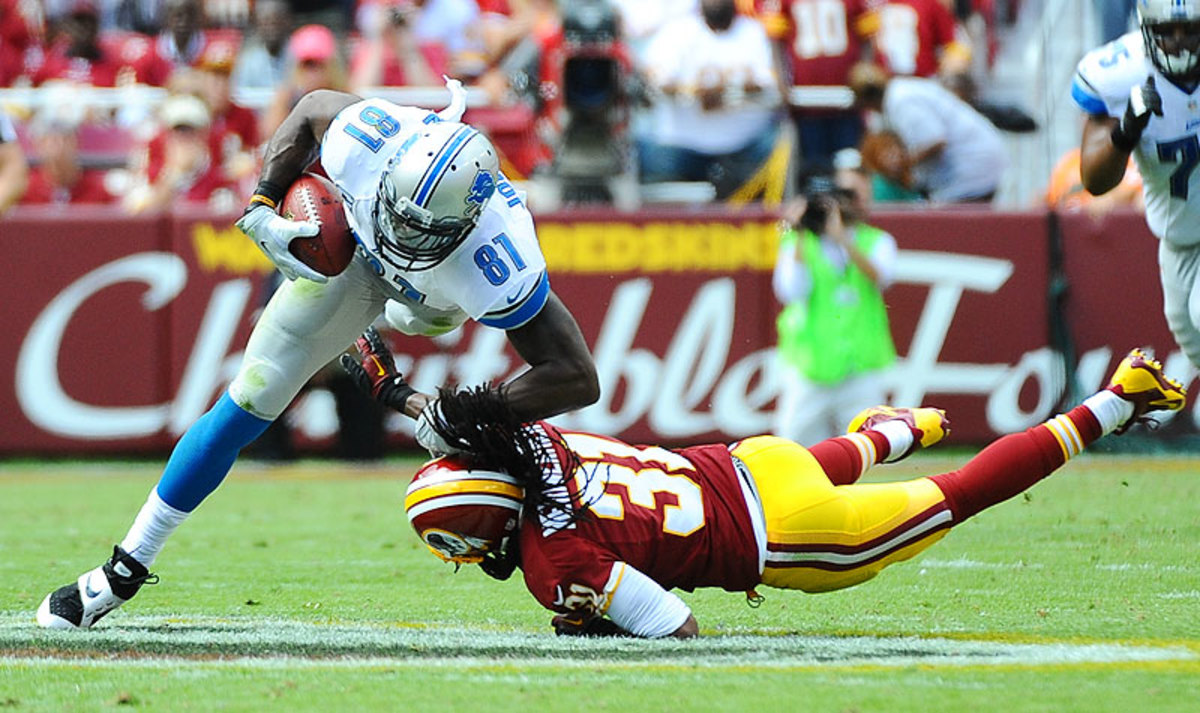 With hits to the head outlawed and drawing heavy punishment, safety Brandon Meriweather has vowed to aim low. That could prove dangerous for receivers like Calvin Johnson. (Jonathan Newton/Getty Images)