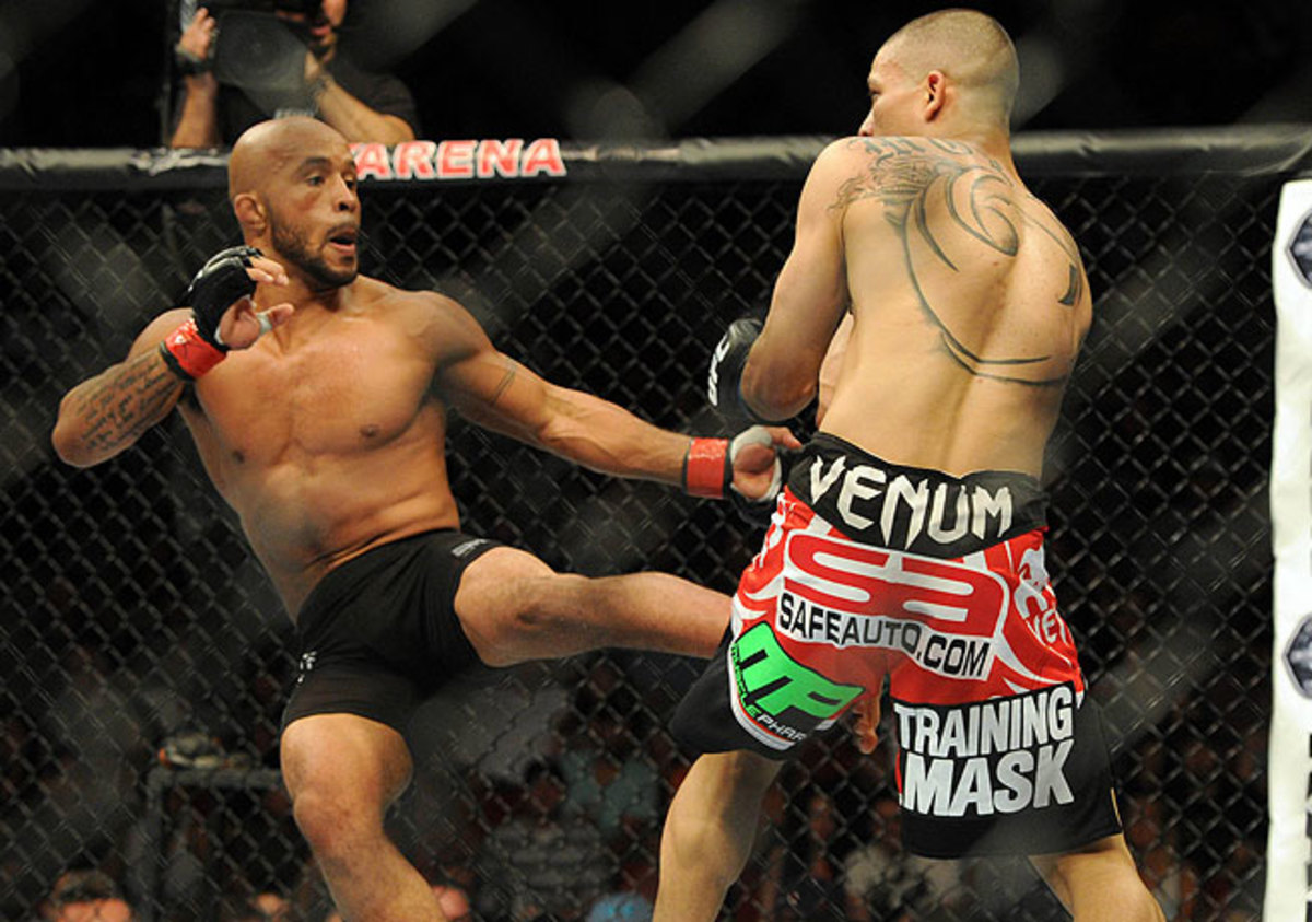 Demetrious Johnson (left) defended his flyweight title for the second time by defeating John Moraga.