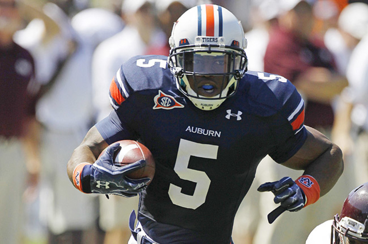 Dyer rushed for more than 1,000 yards in each of his two seasons at Auburn but was dismissed.