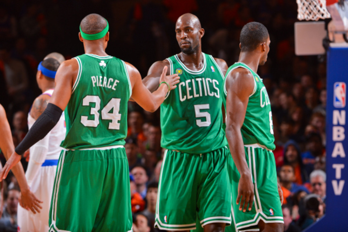 Paul Pierce and Kevin Garnett in Round 1 of the NBA playoffs against the Knicks. The Celtics are reportedly discussing trading the two future Hall of Famers to the Nets. (Jesse D. Garrabrant/Getty Images)