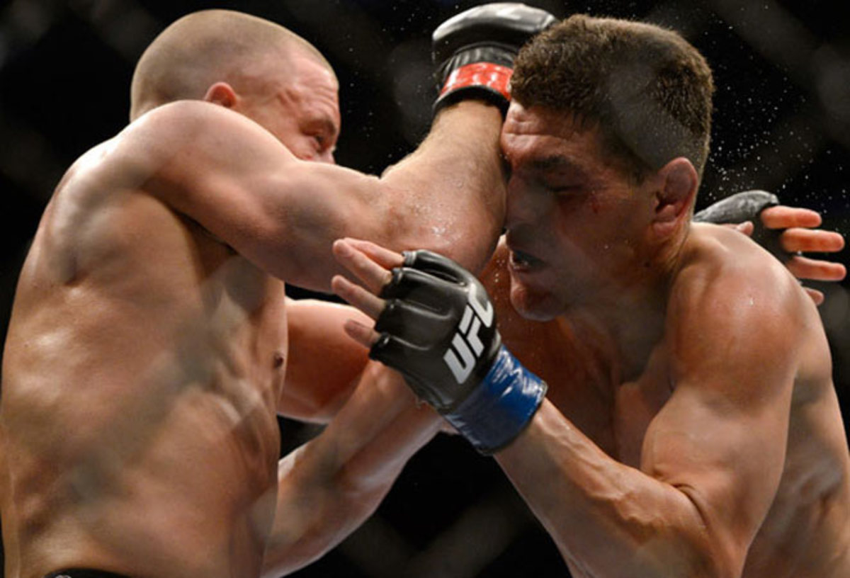 Georges St-Pierre dominated Nick Diaz for five rounds to retain his UFC welterweight belt.