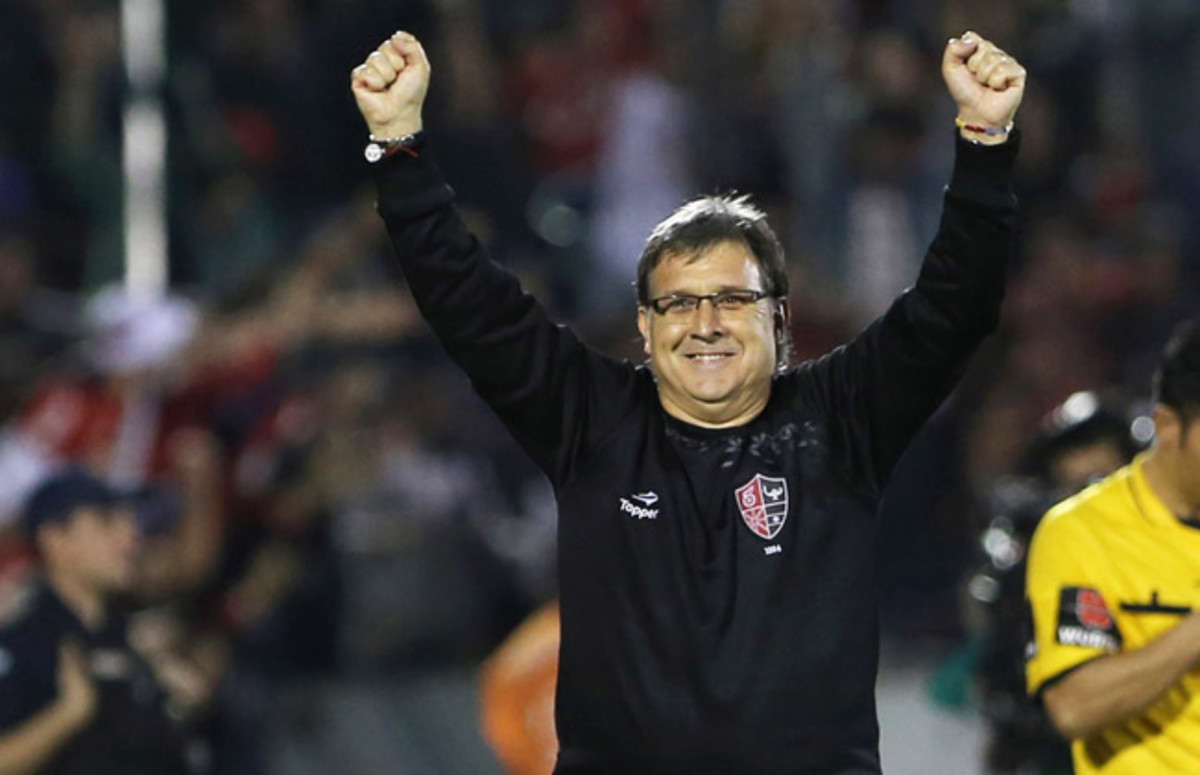 Barcelona picks Gerardo Martino as coach - Sports Illustrated