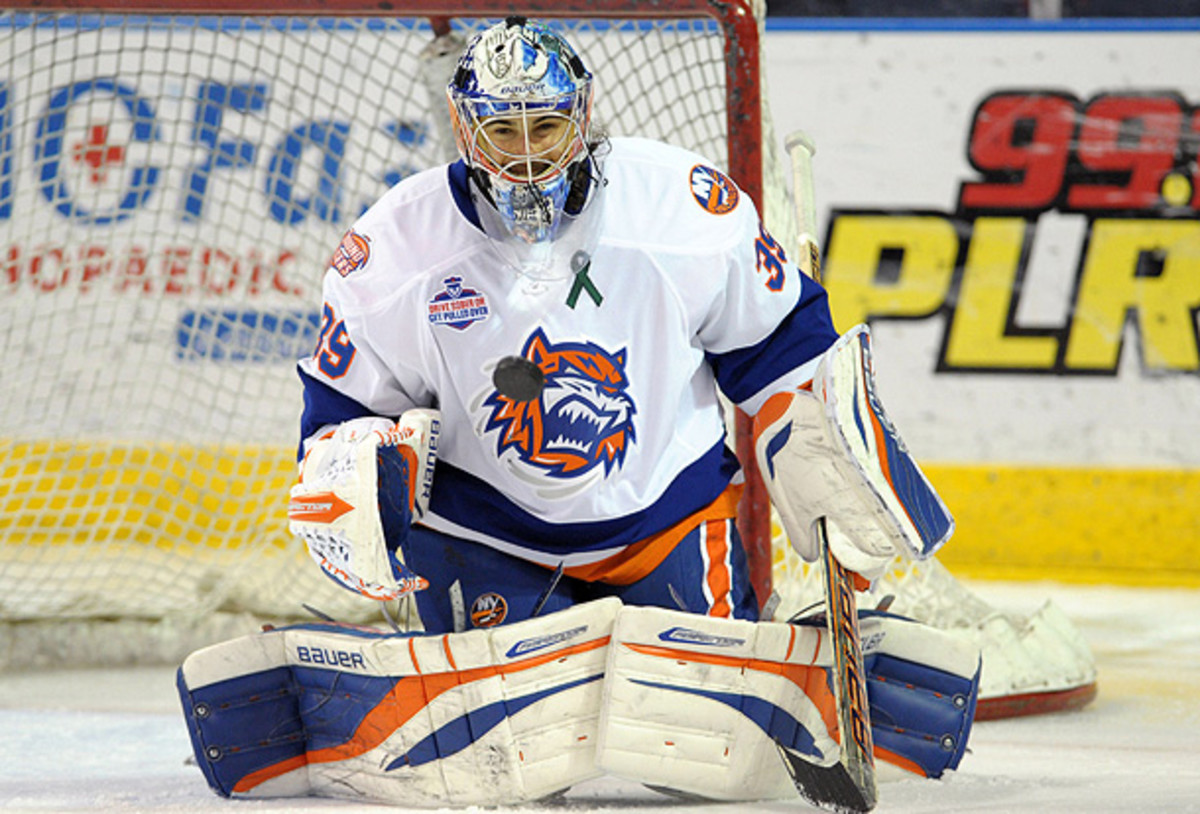 The Islanders have ended one of the sport's longest and strangest relationships by buying out Rick DiPietro's contract. (Christopher Pasatieri/Getty Images)