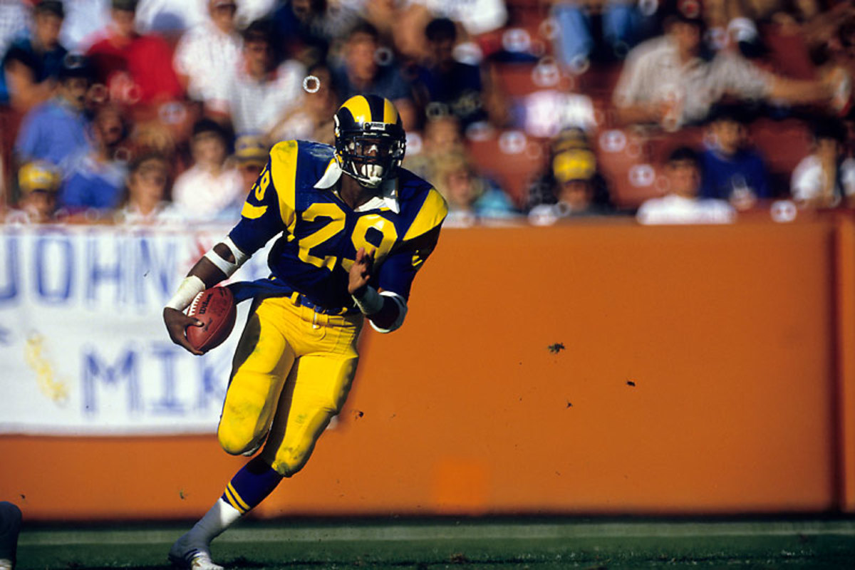 Eric Dickerson’s 2105 yards in 1984 has stood the test of time, though he had two more games than Brown, Simpson or Payton did in their most productive years. (Peter Read Miller/Sports Illustrated) 