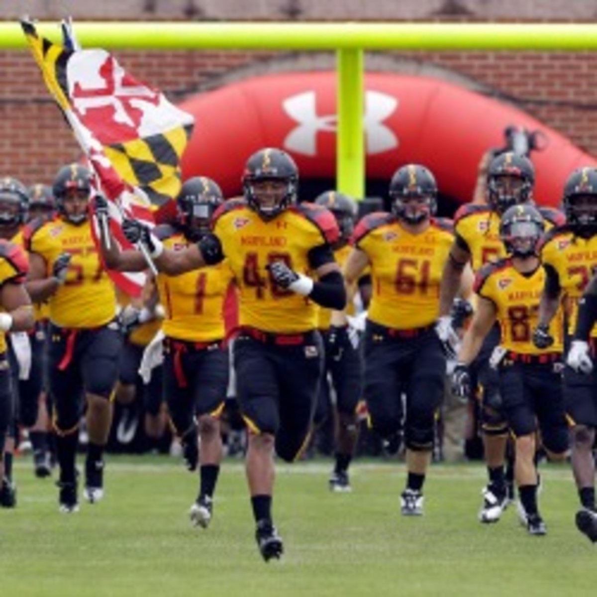 Defensive back Matt Robinson #40 of the Maryland Terrapins leads the team onto the field. (Photo by Rob Carr/Getty Images)