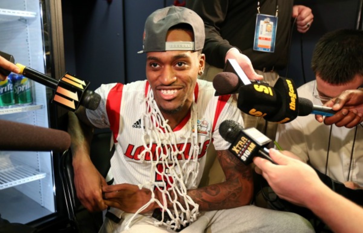 Kevin Ware helped his Louisville teammates cut down the net on the 2013 tournament title. (Andy Lyons/Getty Images)