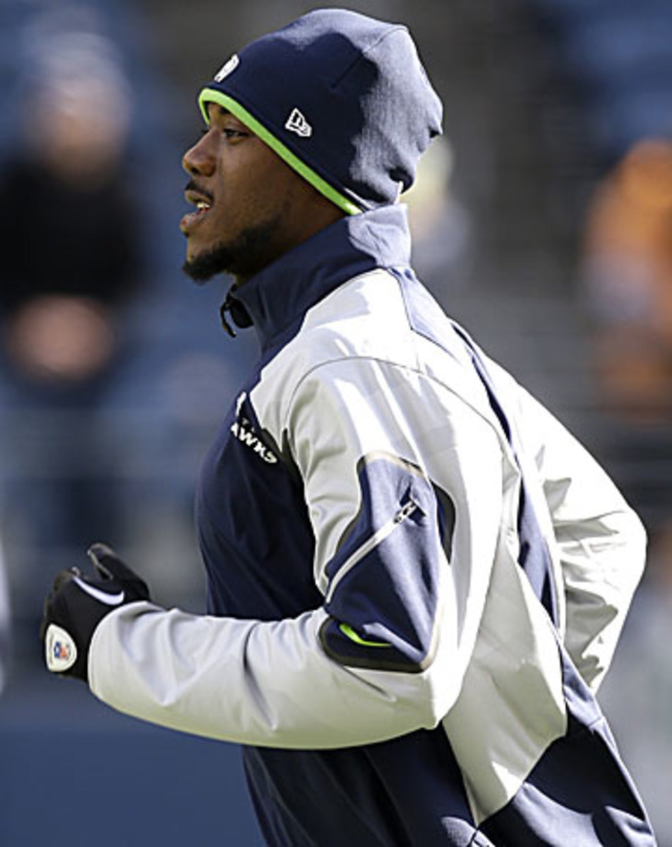 You've seen Percy Harvin in street clothes a lot more than you've seen him in a Seahawks uniform this season. (Elaine Thompson/AP)